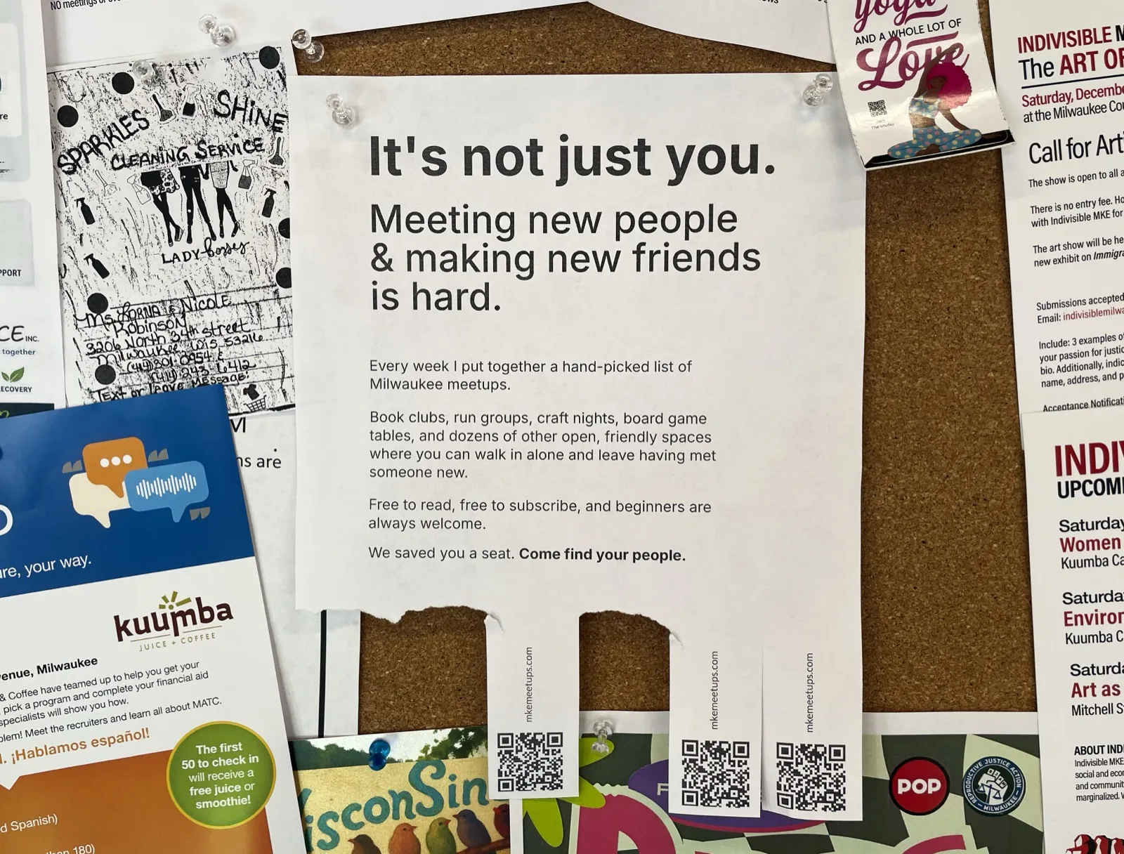 Poster A pinned to a real cork bulletin board among other flyers, its “It’s not just you.” headline above mkemeetups.com QR tear-tabs cut and hanging loose.